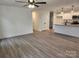 Open-concept living space with new vinyl floors and abundant natural light at 833 Arlington Ave, Rock Hill, SC 29730