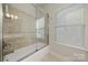 Bathroom with shower and soaking tub at 9069 Blue Ridge Dr, Indian Land, SC 29707
