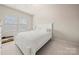 Bedroom with neutral colors and bright light at 9069 Blue Ridge Dr, Indian Land, SC 29707
