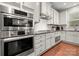 Gourmet kitchen featuring stainless steel appliances and custom cabinetry at 9069 Blue Ridge Dr, Indian Land, SC 29707