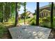 Wooden deck in backyard with a view of the house and trees at 9069 Blue Ridge Dr, Indian Land, SC 29707