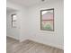 Bright bedroom featuring a window with a view of the surrounding buildings at 908 Woodside Dr, Kings Mountain, NC 28086