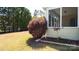 View of the rear of the home, screened in back porch, and fenced yard at 9319 Kestral Ridge Dr, Charlotte, NC 28269