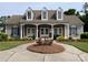 Charming community clubhouse features a welcoming entrance and well-maintained landscaping at 9319 Kestral Ridge Dr, Charlotte, NC 28269