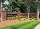 A brick sign marks the entrance to the Falcon Ridge community at 9319 Kestral Ridge Dr, Charlotte, NC 28269