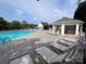 Resort-style community pool with ample lounge chairs and a shaded gazebo area at 9319 Kestral Ridge Dr, Charlotte, NC 28269