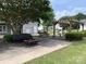 Relax and unwind by the community fire pit and pergola-covered seating area at 9319 Kestral Ridge Dr, Charlotte, NC 28269