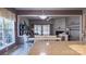 Kitchen with granite countertops, stainless appliances, and open view into dining area at 9319 Kestral Ridge Dr, Charlotte, NC 28269