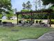 Community pergola with tables and seating, perfect for outdoor gatherings at 9319 Kestral Ridge Dr, Charlotte, NC 28269