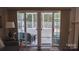 View of the screened-in porch, featuring sliding glass doors to the living room at 9319 Kestral Ridge Dr, Charlotte, NC 28269