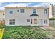 This home features a spacious backyard with a patio, lawn and mature trees at 98 Poplar Woods Dr, Concord, NC 28027