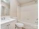 Neutral bathroom featuring a combination tub/shower and a vanity at 10325 Merlin Meadows Ct, Charlotte, NC 28277