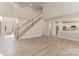 Spacious foyer featuring high ceilings, hardwood floors and staircase at 10325 Merlin Meadows Ct, Charlotte, NC 28277