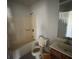 Bathroom features a vanity, a toilet, and a shower-tub combo at 104 Edgewater Nw Dr, Concord, NC 28027
