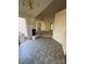 The dining area features tile flooring, a fireplace, and access to the back yard at 104 Edgewater Nw Dr, Concord, NC 28027