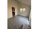 Open dining area showcasing tile flooring, natural light, and access to other living spaces at 104 Edgewater Nw Dr, Concord, NC 28027