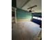 A garage featuring an automatic door opener and built-in storage at 104 Edgewater Nw Dr, Concord, NC 28027