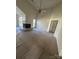 Spacious living room with a fireplace, vaulted ceilings, ceiling fan, and natural light from large sliding doors at 104 Edgewater Nw Dr, Concord, NC 28027