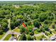 Expansive aerial view showcasing the property's lush landscaping and neighborhood at 107 Southfork Dr, Belmont, NC 28012