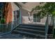 Charming back deck with ample seating and beautiful views, perfect for outdoor relaxation at 107 Southfork Dr, Belmont, NC 28012