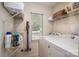 Laundry room with washer, dryer, shelves and plenty of storage space at 107 Southfork Dr, Belmont, NC 28012