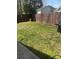 Fenced backyard with a grill, offering outdoor space for relaxation at 110 Buffalo Nw Ave, Concord, NC 28025
