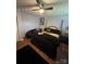 Cozy main bedroom with a four-poster bed and a dark color palette at 110 Buffalo Nw Ave, Concord, NC 28025