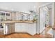 Bright, modern kitchen with stainless steel appliances and granite countertops, open to living spaces at 11204 Arlen Park Dr, Huntersville, NC 28078