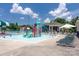 Fun splash pad with colorful play structures, shallow water, and plenty of seating for families at 11204 Arlen Park Dr, Huntersville, NC 28078