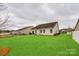 Large, grassy backyard, partial fence, providing privacy and a sense of openness at 1129 Black Walnut Rd, Clover, SC 29710