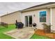 Well-maintained backyard with a patio area, grills, and a lush lawn, perfect for outdoor entertaining at 1129 Black Walnut Rd, Clover, SC 29710