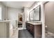 Bright bathroom features double vanity with granite countertops and a separate tub at 1129 Black Walnut Rd, Clover, SC 29710