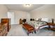 Spacious bedroom featuring a bed, desk, large dressers and natural light at 1129 Black Walnut Rd, Clover, SC 29710
