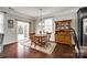 Dining room with wood table, chairs, china cabinet, and access to the outdoor area at 1129 Black Walnut Rd, Clover, SC 29710