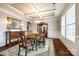 Formal dining room with coffered ceilings, hardwood floors, and elegant furnishings at 1129 Black Walnut Rd, Clover, SC 29710