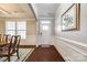 Elegant foyer featuring hardwood floors, decorative molding, and a view into the dining room at 1129 Black Walnut Rd, Clover, SC 29710