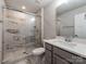 Modern bathroom featuring a glass-enclosed shower and stylish vanity at 11939 Fiddlers Roof Ln, Charlotte, NC 28277