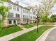 Inviting townhomes boast meticulous landscaping and charming lamppost lighting at 11939 Fiddlers Roof Ln, Charlotte, NC 28277