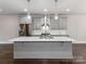 Kitchen with quartz countertops, stainless appliances, subway tile backsplash, and pendant lights at 11939 Fiddlers Roof Ln, Charlotte, NC 28277