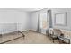 Sunlit bedroom with neutral tones, offering space for furniture and decor at 120 Vermillion Loop, Statesville, NC 28625