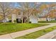 Charming two-story home with manicured lawn and inviting curb appeal at 120 Vermillion Loop, Statesville, NC 28625