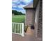 Exterior view from the backyard showcasing a wood deck, manicured lawn, and landscaping at 132 Postell Dr, Statesville, NC 28625