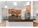 Beautiful kitchen features granite counters, tile backsplash, stainless appliances and pendant lighting at 132 Postell Dr, Statesville, NC 28625