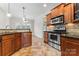 Kitchen featuring stainless steel appliances, granite countertops, and tile backsplash at 132 Postell Dr, Statesville, NC 28625