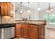 Kitchen area with stainless steel appliances, granite countertops, and cherry wood cabinets at 132 Postell Dr, Statesville, NC 28625