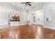 Spacious living room boasts hardwood floors, coffered ceiling, white columns and lots of natural light at 132 Postell Dr, Statesville, NC 28625