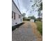 Exterior showcasing home's side, patio, and backyard shed and carport at 1421 Van Nuys St, Salisbury, NC 28144
