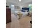 Inviting bedroom with plush carpeting, a comfortable bed, and ample natural light from large windows at 1421 Van Nuys St, Salisbury, NC 28144