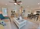 Bright living room with an open-concept design flowing into dining and kitchen areas at 1421 Van Nuys St, Salisbury, NC 28144