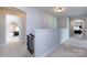 Second floor hallway with views into bedrooms at 15225 Kissimmee Ln, Mint Hill, NC 28227